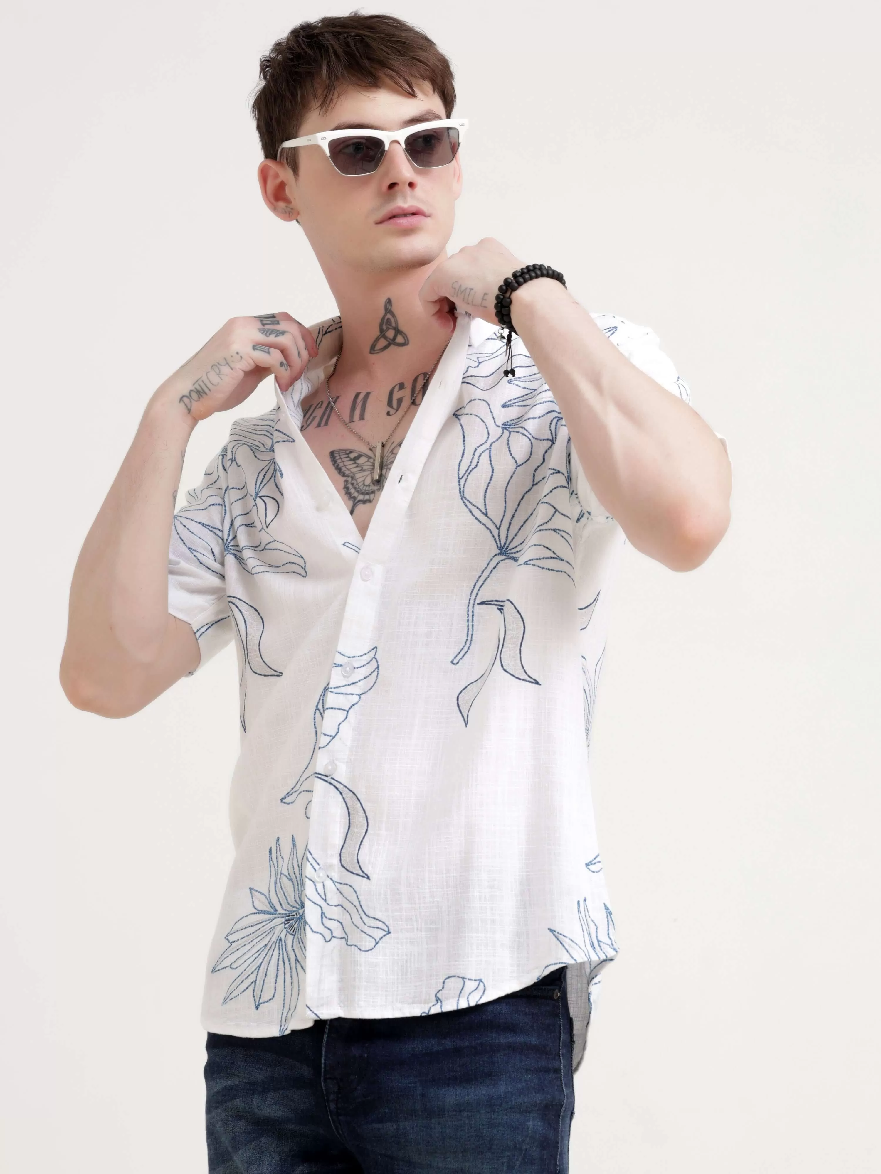 Floral printed blue half sleeve shirt